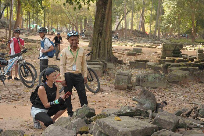 Angkor Sunrise Bike Tour with Lunch Included - Bayon Temple: faces, daily life scenes, and how Khmer builders made it work