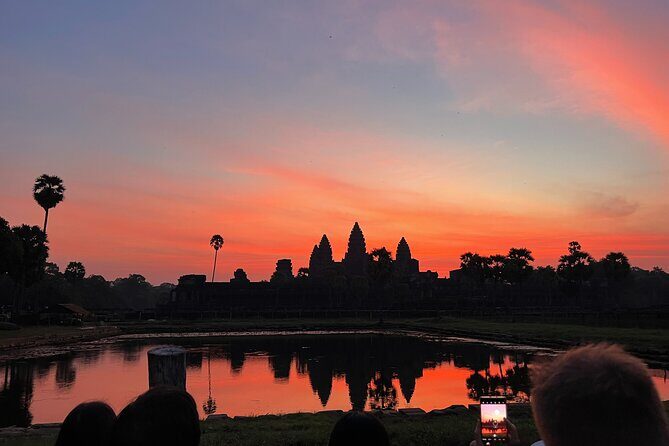 Angkor Sunrise Bike Tour with Lunch Included - Entering Angkor Wat: sunrise, ticket timing, and reflection ponds