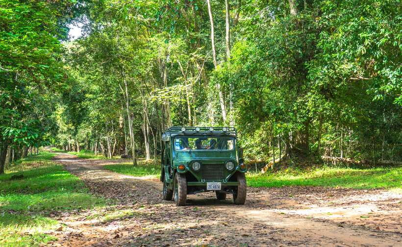 Angkor Wat: Guided Jeep Tour Inclusive lunch at local house - Angkor Thom: the stone gate with elephants and giant faces