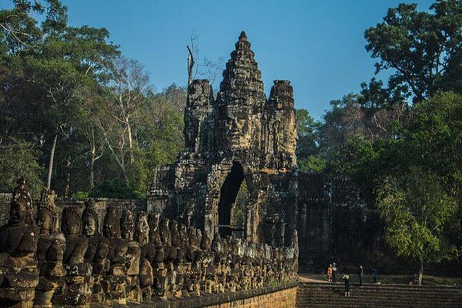 Angkor Wat highlight Tour From Sunrise -Small Group - Bayon Temple and its face towers: why people stop and stare