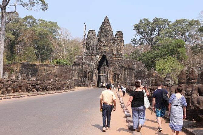 Angkor Wat highlight Tour From Sunrise -Small Group - Ta Prohm: jungle vibes and the walking reality