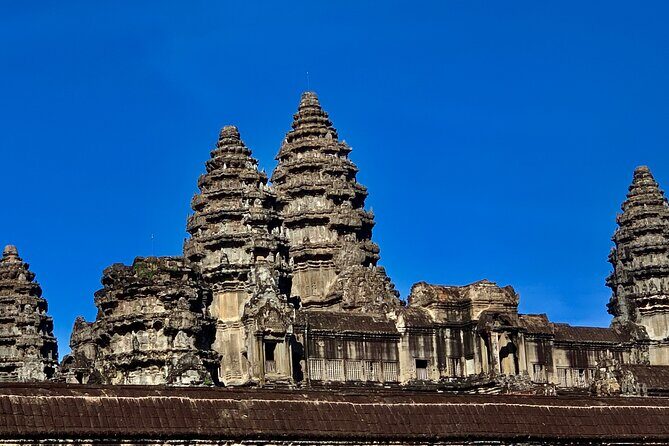 Angkor Wat Small Circuit & Sunset Tour - Angkor Thom via Victory Gate: Where the Sunset Really Works