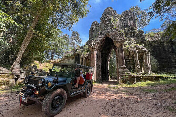 Angkor Wat Sunrise and Market Tour by Jeep - Ta Prohm: The Jungle Temple Effect (Roots Included)