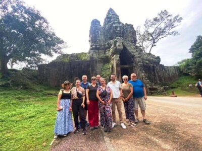 Explore Angkor Temple Sunset With Tour Guided - South Gate of Angkor Thom: Four Faces and an Instant Story