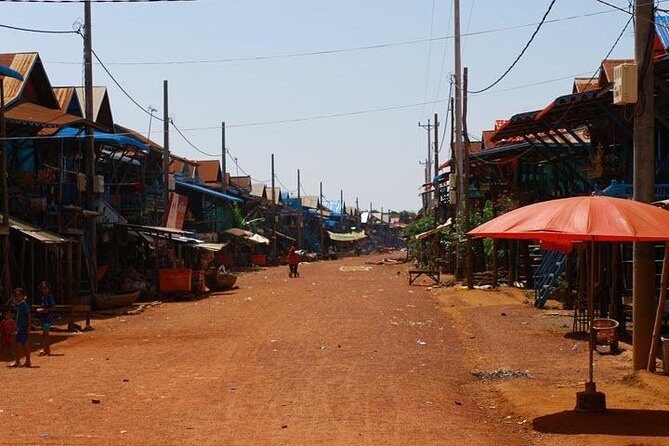 Kampong Phluk Floating Village & Sunset Lake Canoe Tour - Pickup, air-con, and timing for a 4-to-5 hour outing