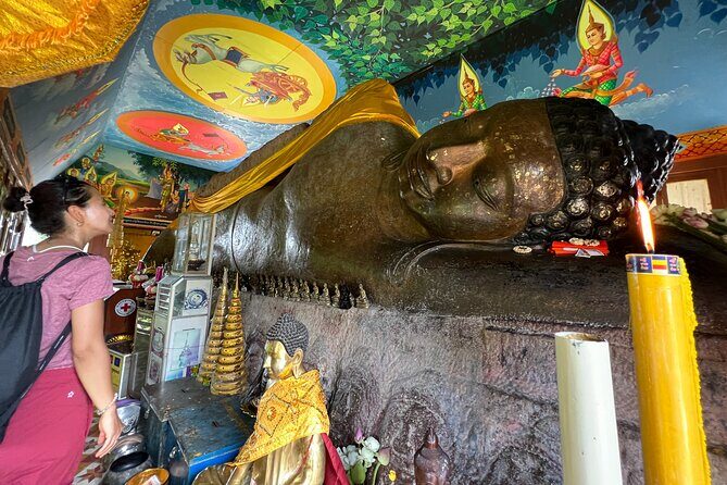 Kulen Mountain Beng Mealea and Banteay Srei Tour from Siem Reap - Preah Ang Thom: the reclining Buddha cut into the mountainside