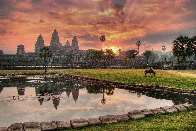One Day Private Guide Tour of Angkor Thom, Bayon, Ta Phrom & Angkor Wat - Entering Angkor Thom from the South Gate’s ocean-churning scene