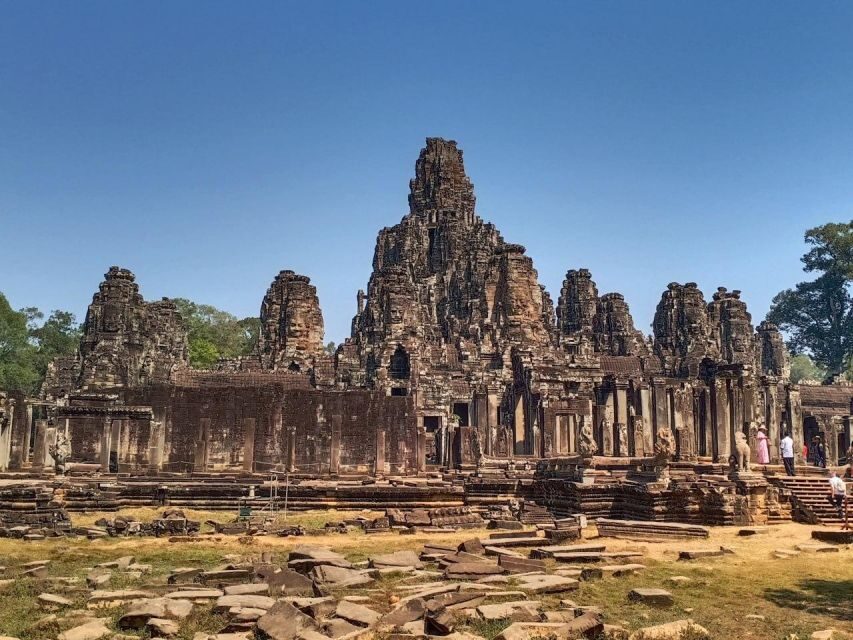 Sharing Trip to Angkor Temple with sunset - Bayon Temple: 216 faces, carvings, and where to stand