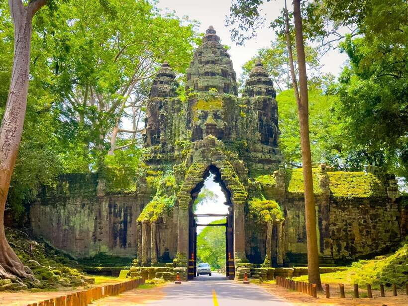 Siem Reap: Angkor Wat, Bayon & Ta Prohm Guided Tour - Angkor Thom and Bayon: the city vibe, the face towers, and a better sense of place