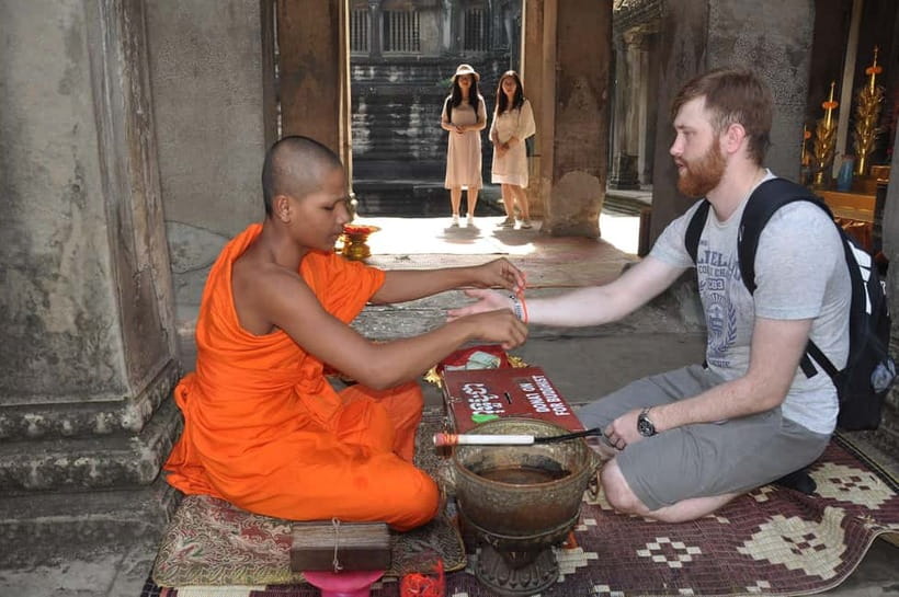 Siem Reap Cambodian Buddhist Water Blessing and Local Market - Countryside pagoda setting just south of Siem Reap