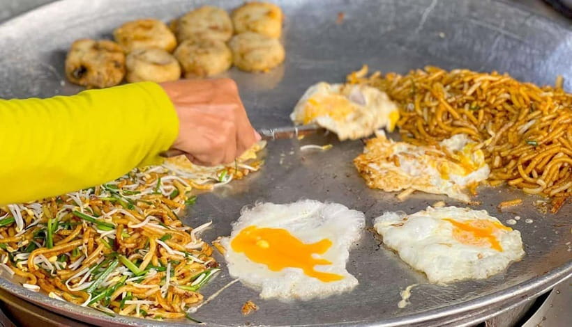 Siem Reap: Street Food Experience by Tuk-Tuk - Street 60 and the big night market: skewers, sweets, and the insect moment