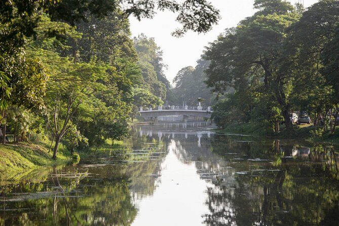 Siem Reap Walking Tour: Landmarks & Hidden Gems - Walking the Siem Reap Riverside Park: shade, river basics, and bridge stories