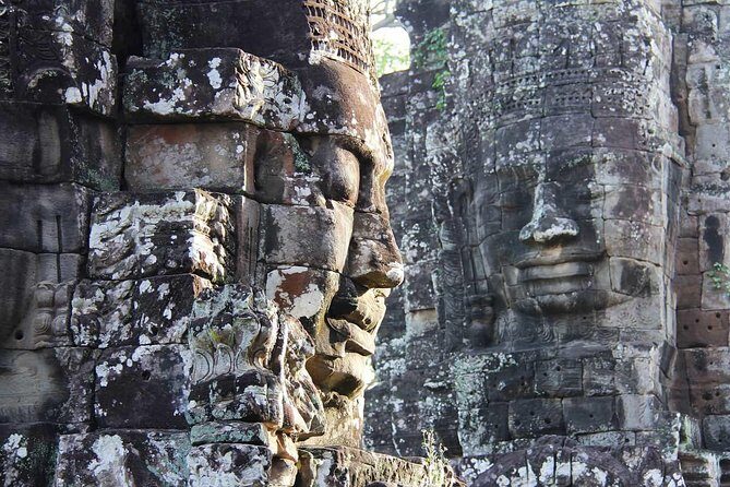 Sunrise Small Group Tour to Angkor Wat Temple - Bayon Temple faces and possible monk blessing
